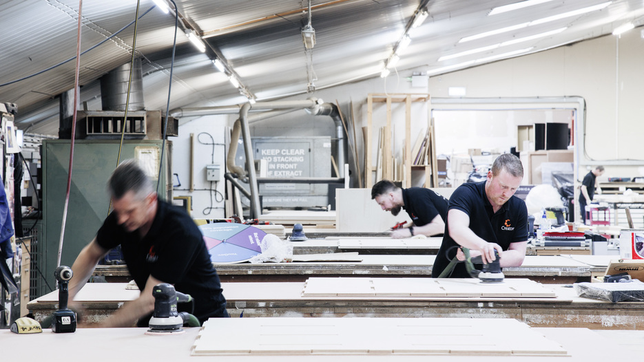 The Creator team sanding some Opendesk parts