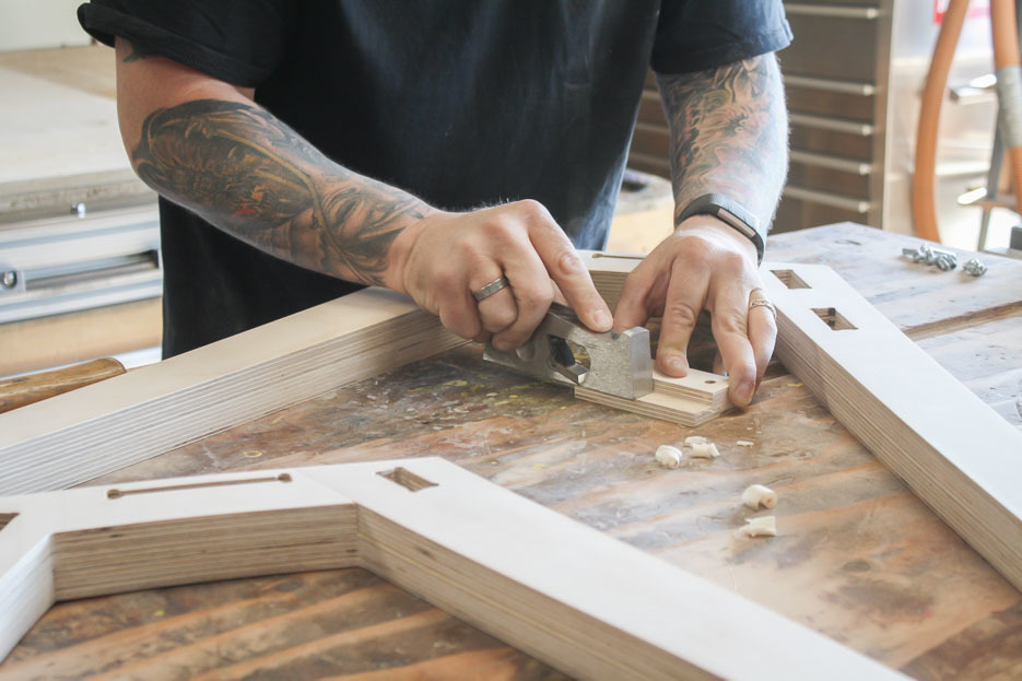 Kyle finishing an Opendesk Studio Desk