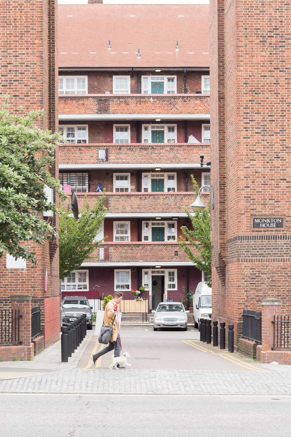 Lynton walking outside his home in Hackney